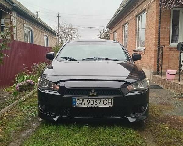 Чорний Міцубісі Lancer, об'ємом двигуна 2 л та пробігом 273 тис. км за 7100 $, фото 8 на Automoto.ua