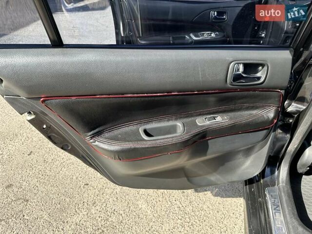 Черный Мицубиси Лансер, объемом двигателя 2 л и пробегом 272 тыс. км за 5514 $, фото 15 на Automoto.ua