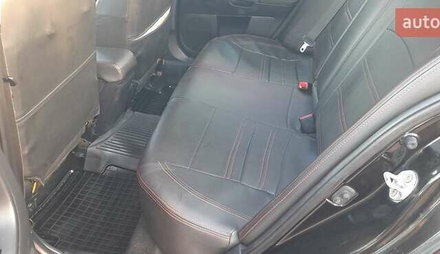 Міцубісі Lancer 2007 у Києві на Automoto.ua Чорний Міцубісі Lancer, об'ємом двигуна 2 л та пробігом 238 тис. км за 5350 $, фото 9 на Automoto.ua