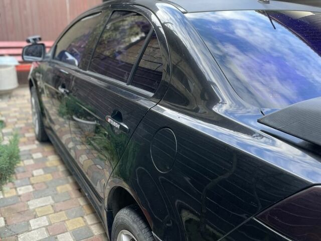 Чорний Міцубісі Lancer, об'ємом двигуна 2 л та пробігом 175 тис. км за 6500 $, фото 8 на Automoto.ua