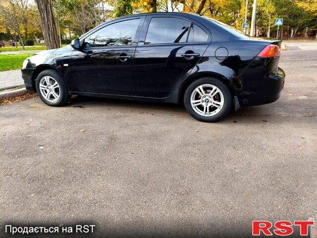 Черный Мицубиси Лансер, объемом двигателя 1.5 л и пробегом 207 тыс. км за 5500 $, фото 6 на Automoto.ua