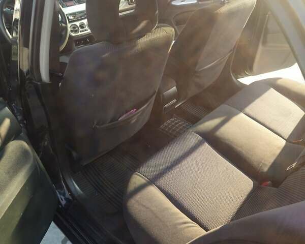 Чорний Міцубісі Lancer, об'ємом двигуна 1.59 л та пробігом 180 тис. км за 4999 $, фото 13 на Automoto.ua