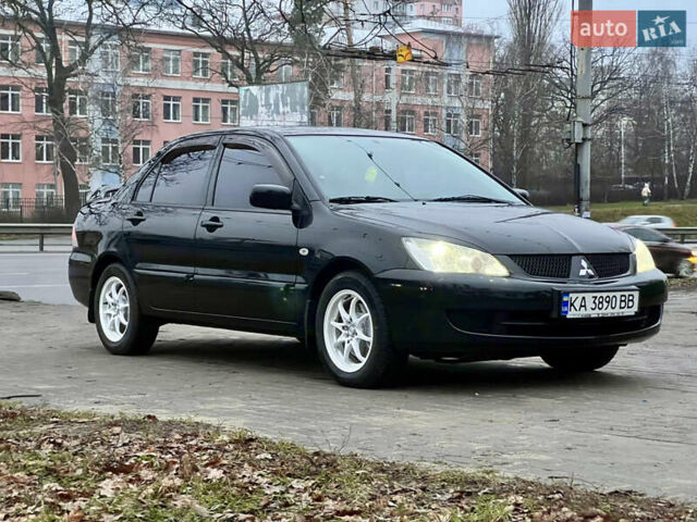 Чорний Міцубісі Lancer, об'ємом двигуна 1.6 л та пробігом 303 тис. км за 4350 $, фото 7 на Automoto.ua