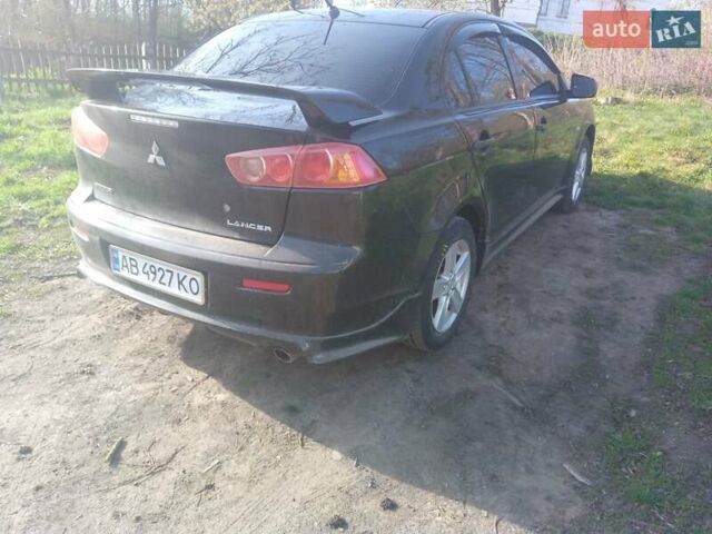 Чорний Міцубісі Lancer, об'ємом двигуна 2 л та пробігом 180 тис. км за 7300 $, фото 2 на Automoto.ua