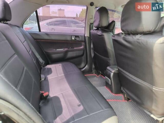Чорний Міцубісі Lancer, об'ємом двигуна 2 л та пробігом 161 тис. км за 4300 $, фото 2 на Automoto.ua