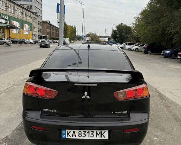 Черный Мицубиси Лансер, объемом двигателя 2 л и пробегом 183 тыс. км за 7800 $, фото 10 на Automoto.ua
