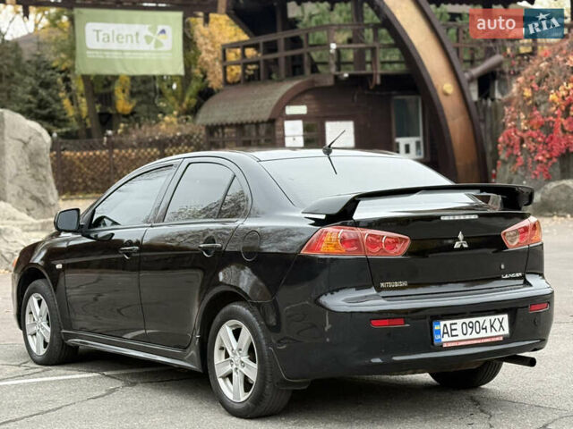 Чорний Міцубісі Lancer, об'ємом двигуна 2 л та пробігом 224 тис. км за 6500 $, фото 5 на Automoto.ua