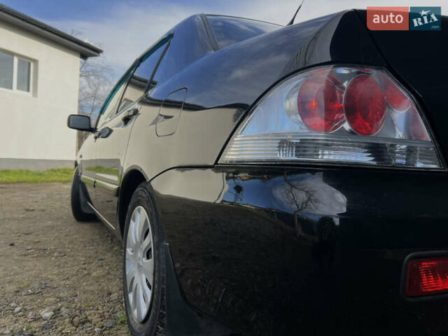 Чорний Міцубісі Lancer, об'ємом двигуна 1.58 л та пробігом 185 тис. км за 3750 $, фото 4 на Automoto.ua