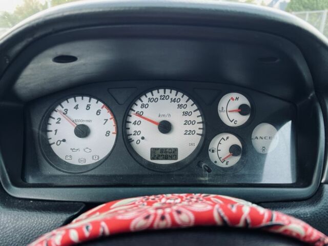 Чорний Міцубісі Lancer, об'ємом двигуна 1.6 л та пробігом 228 тис. км за 3300 $, фото 12 на Automoto.ua