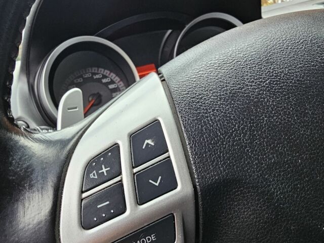 Черный Мицубиси Лансер, объемом двигателя 2 л и пробегом 115 тыс. км за 5000 $, фото 20 на Automoto.ua