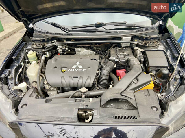 Чорний Міцубісі Lancer, об'ємом двигуна 2 л та пробігом 222 тис. км за 7500 $, фото 19 на Automoto.ua