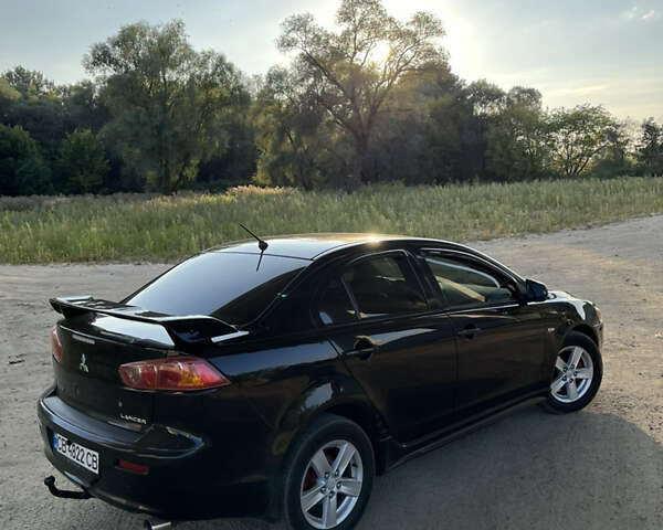 Чорний Міцубісі Lancer, об'ємом двигуна 2 л та пробігом 230 тис. км за 6700 $, фото 7 на Automoto.ua