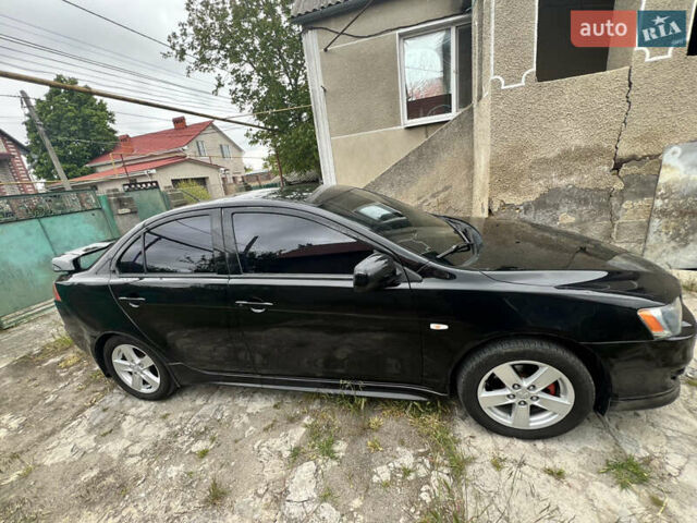 Чорний Міцубісі Lancer, об'ємом двигуна 2 л та пробігом 200 тис. км за 6900 $, фото 7 на Automoto.ua
