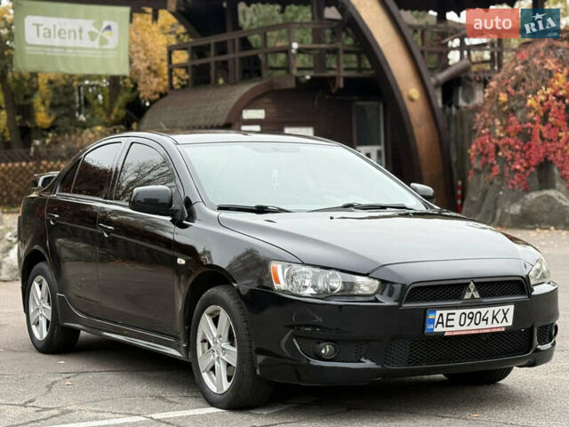 Чорний Міцубісі Lancer, об'ємом двигуна 2 л та пробігом 224 тис. км за 6500 $, фото 1 на Automoto.ua