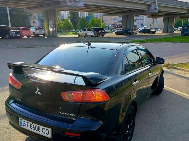 Черный Мицубиси Лансер, объемом двигателя 1.5 л и пробегом 215 тыс. км за 5600 $, фото 2 на Automoto.ua