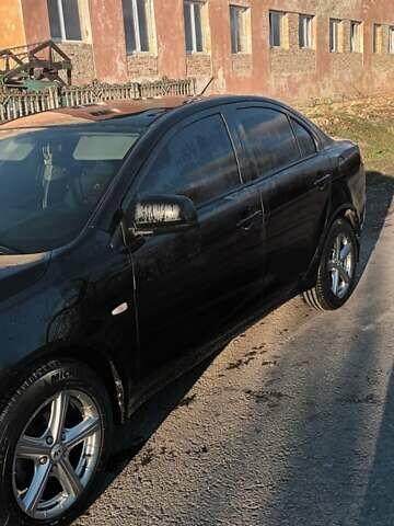 Черный Мицубиси Лансер, объемом двигателя 1.5 л и пробегом 270 тыс. км за 4999 $, фото 6 на Automoto.ua