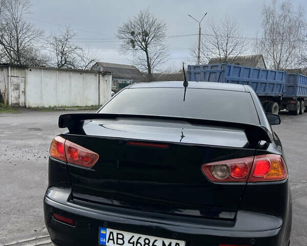 Черный Мицубиси Лансер, объемом двигателя 2 л и пробегом 350 тыс. км за 6700 $, фото 3 на Automoto.ua