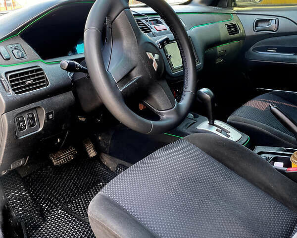 Чорний Міцубісі Lancer, об'ємом двигуна 1.6 л та пробігом 195 тис. км за 5200 $, фото 13 на Automoto.ua