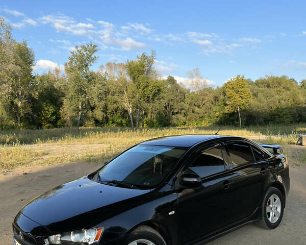 Чорний Міцубісі Lancer, об'ємом двигуна 2 л та пробігом 230 тис. км за 6700 $, фото 3 на Automoto.ua