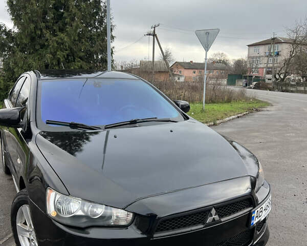 Черный Мицубиси Лансер, объемом двигателя 2 л и пробегом 350 тыс. км за 6700 $, фото 1 на Automoto.ua