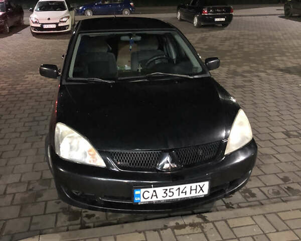 Чорний Міцубісі Lancer, об'ємом двигуна 1.6 л та пробігом 280 тис. км за 3800 $, фото 20 на Automoto.ua