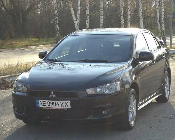 Черный Мицубиси Лансер, объемом двигателя 2 л и пробегом 224 тыс. км за 7000 $, фото 4 на Automoto.ua