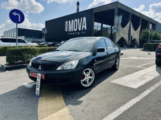 Чорний Міцубісі Lancer, об'ємом двигуна 1.6 л та пробігом 228 тис. км за 3300 $, фото 1 на Automoto.ua