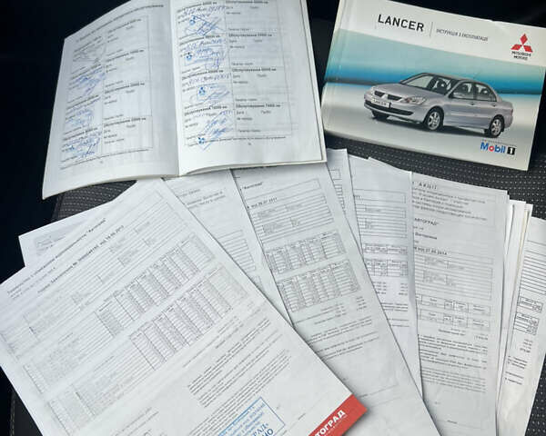 Чорний Міцубісі Lancer, об'ємом двигуна 1.58 л та пробігом 175 тис. км за 5200 $, фото 10 на Automoto.ua