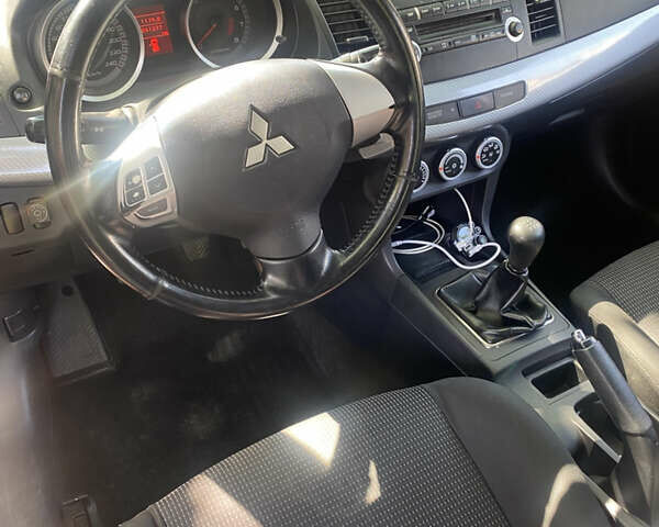 Чорний Міцубісі Lancer, об'ємом двигуна 1.5 л та пробігом 241 тис. км за 5400 $, фото 9 на Automoto.ua