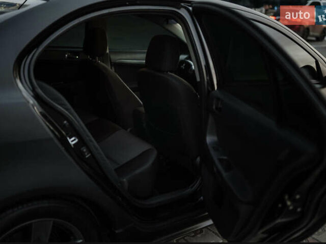 Чорний Міцубісі Lancer, об'ємом двигуна 2 л та пробігом 203 тис. км за 7000 $, фото 20 на Automoto.ua