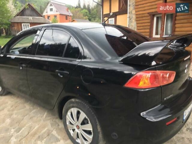 Черный Мицубиси Лансер, объемом двигателя 1.5 л и пробегом 240 тыс. км за 6900 $, фото 12 на Automoto.ua