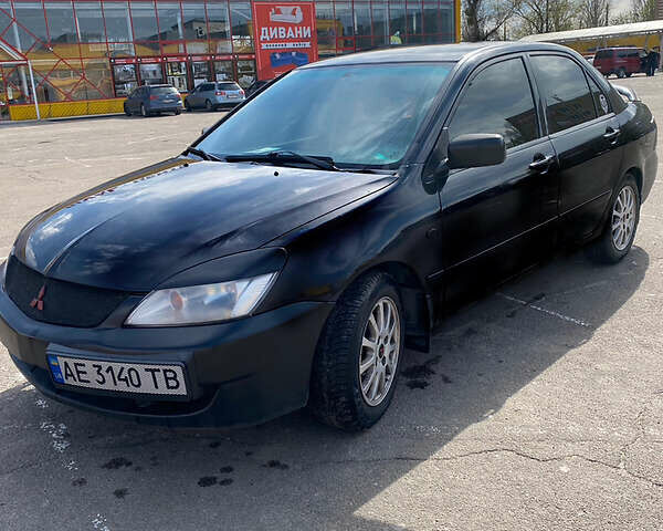 Чорний Міцубісі Lancer, об'ємом двигуна 1.6 л та пробігом 195 тис. км за 5200 $, фото 2 на Automoto.ua