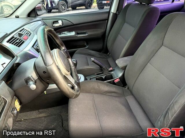 Черный Мицубиси Лансер, объемом двигателя 1.6 л и пробегом 260 тыс. км за 3700 $, фото 5 на Automoto.ua