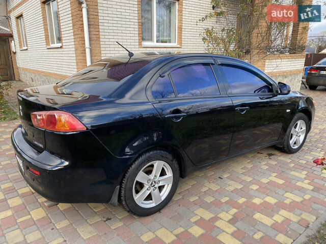 Чорний Міцубісі Lancer, об'ємом двигуна 1.5 л та пробігом 240 тис. км за 5650 $, фото 9 на Automoto.ua