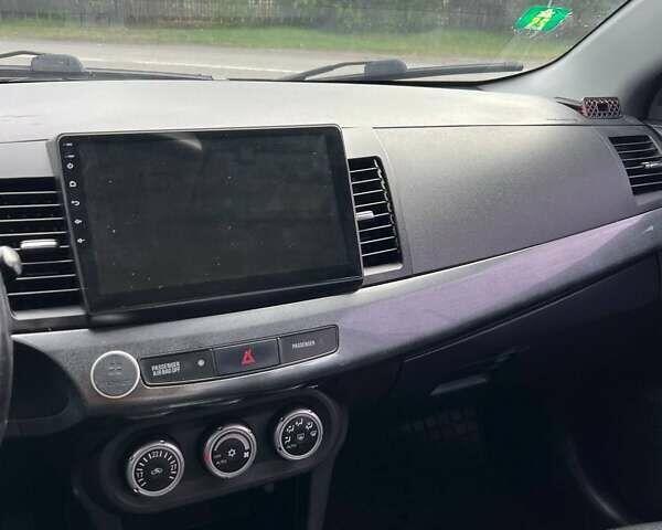 Чорний Міцубісі Lancer, об'ємом двигуна 2 л та пробігом 284 тис. км за 6200 $, фото 21 на Automoto.ua
