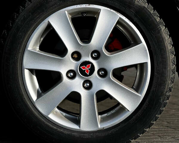 Черный Мицубиси Лансер, объемом двигателя 2 л и пробегом 333 тыс. км за 7300 $, фото 10 на Automoto.ua