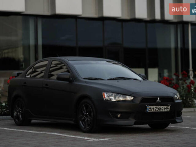 Чорний Міцубісі Lancer, об'ємом двигуна 2 л та пробігом 203 тис. км за 7000 $, фото 21 на Automoto.ua