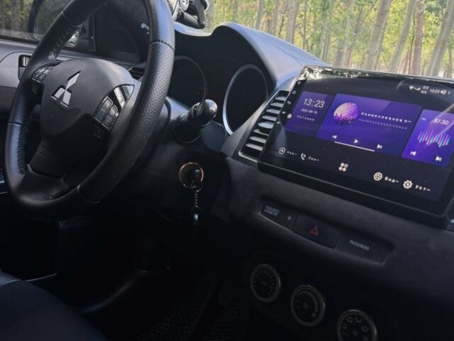 Черный Мицубиси Лансер, объемом двигателя 2 л и пробегом 280 тыс. км за 6800 $, фото 4 на Automoto.ua