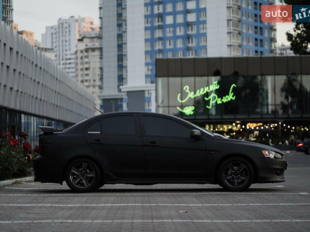 Чорний Міцубісі Lancer, об'ємом двигуна 2 л та пробігом 203 тис. км за 7000 $, фото 34 на Automoto.ua