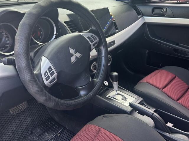 Мицубиси Лансер 2007 в Запорожье на Automoto.ua Черный Мицубиси Лансер, объемом двигателя 2 л и пробегом 208 тыс. км за 6800 $, фото 7 на Automoto.ua