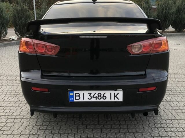 Чорний Міцубісі Lancer, об'ємом двигуна 2 л та пробігом 194 тис. км за 5950 $, фото 3 на Automoto.ua