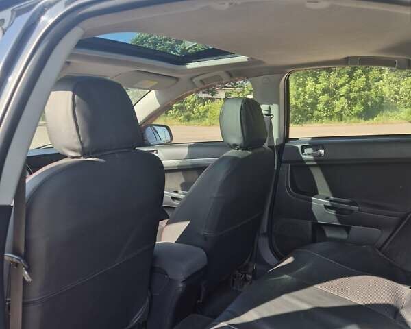 Чорний Міцубісі Lancer, об'ємом двигуна 2 л та пробігом 243 тис. км за 6600 $, фото 22 на Automoto.ua