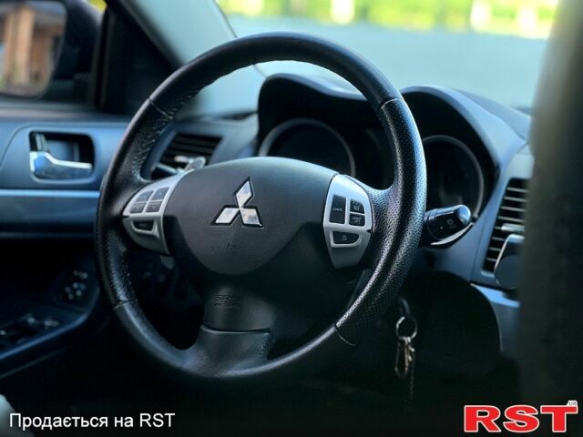 Чорний Міцубісі Lancer, об'ємом двигуна 2 л та пробігом 205 тис. км за 6500 $, фото 10 на Automoto.ua
