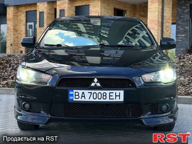 Чорний Міцубісі Lancer, об'ємом двигуна 2 л та пробігом 205 тис. км за 6500 $, фото 6 на Automoto.ua