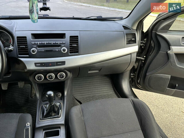 Чорний Міцубісі Lancer, об'ємом двигуна 2 л та пробігом 192 тис. км за 6500 $, фото 26 на Automoto.ua
