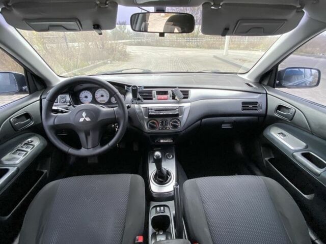 Черный Мицубиси Лансер, объемом двигателя 1.6 л и пробегом 263 тыс. км за 2900 $, фото 8 на Automoto.ua