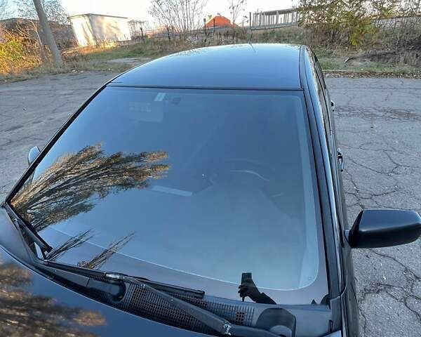 Черный Мицубиси Лансер, объемом двигателя 2 л и пробегом 280 тыс. км за 5400 $, фото 7 на Automoto.ua