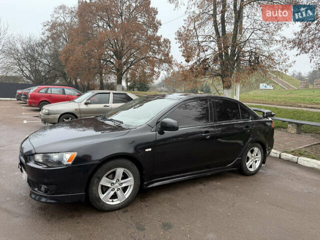 Чорний Міцубісі Lancer, об'ємом двигуна 2 л та пробігом 281 тис. км за 6000 $, фото 2 на Automoto.ua