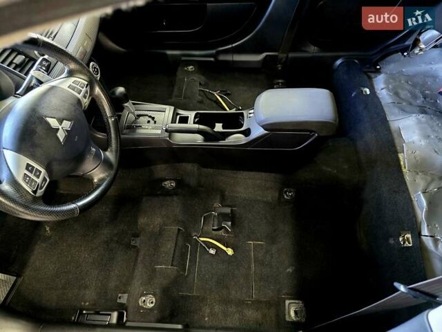 Чорний Міцубісі Lancer, об'ємом двигуна 2 л та пробігом 260 тис. км за 6555 $, фото 46 на Automoto.ua