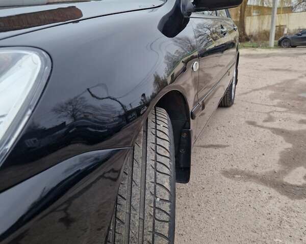 Чорний Міцубісі Lancer, об'ємом двигуна 1.6 л та пробігом 273 тис. км за 3999 $, фото 2 на Automoto.ua